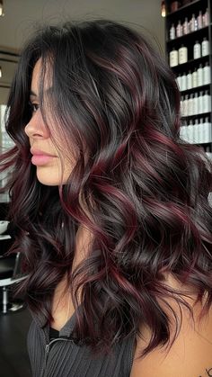 Get the Burgundy Hair of Your Dreams: 25 Expert Ideas for a Stylish Makeover | Lookosm Black And Burgundy Highlights, Dark Cherry Red Highlights In Black Hair, Subtle Hair Highlights For Black Hair, Hair Dye Ideas Burgundy, Burgundy Streaks In Brown Hair, Burgundy Low Lights For Brown Hair, Black With Dark Red Highlights, Cute Highlights For Black Hair