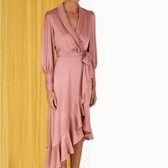 The Zimmerman Silk Wrap Midi Dress In Dusty Pink From Our Fall 2023 Collection, Luminosity. A Silk Midi Dress Featuring A Wrap Front Silhouette, Blouson Sleeves With Elongated Cuffs And Asymmetric Skirt. Silk Midi Dress Wrap Front Asymmetric Ruffled Mini Skirt Blouson Sleeves With Elongated Cuffs, Brand New, Home Free Of Smoke And Pets Pre-draped Long Sleeve Evening Midi Dress, Evening Pre-draped Long Sleeve Midi Dress, Spring Pre-draped Fitted Silk Dress, Spring Silk Midi Dress For Wedding Guest, Spring Wedding Guest Silk Midi Dress, Spring Satin Midi Wrap Dress, Spring Satin Wrap Dress, Midi Length, Feminine Silk Dress For Formal Occasions, Long Sleeve Viscose Midi Dress For Party