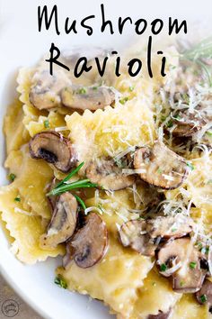 mushroom ravioli on a plate with parmesan cheese and sprig of rosemary