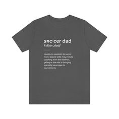 Looking for a shirt that shows off your skills as a soccer dad? Look no further! Our Soccer Dad t-shirt is the perfect way to let everyone know just how important you are on the sidelines. Sure, you may be usually an assistant to soccer mom, but don't sell yourself short! Your special skills are just as valuable as hers. Whether you're coaching from the sidelines, yelling at the refs, or bringing specialty beverages to tournaments, you're a crucial part of the team! So why not show off your skil Soccer Dad Shirt, Papa T Shirt, Football T Shirt, Soccer Mom, Tee Shirt Homme, Dad To Be Shirts, Soccer Jersey, Mens Tees, Gifts For Dad