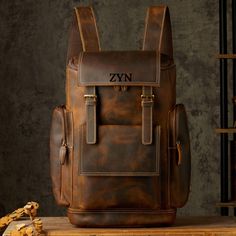 Full grain Leather Backpack Men, Handmade Hiking Bag, Knapsack Large Capacity Laptop backpack, Rucksack Retro School Bag Key Features: Material:🐄 Main Material: GENUINE LEATHER, ensuring durability and a premium feel. 🎨 Lining Material: Acrylic, offering a smooth and sturdy interior. Style:🏍 Style: Moto & Biker, perfect for a rugged and stylish look. Usage:🎒 Use: Backpack, ideal for various occasions including school, work, or travel. Specifications: 📏 Size: 44CM * 31CM * 15CM / 17.3in * 12 Leather Travel Backpack, Vintage Leather Backpack, Leather Backpack For Men, Mens Backpack Travel, Brown Leather Backpack, Hiking Bag, Laptop Rucksack, Leather Projects, Leather Work