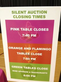 a sign that says pink table closes 7 30 pm orange and flamingo tables close 750 pm