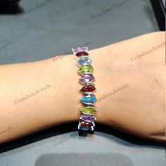 Natural Multi Gemstone Bracelet, 925 Sterling Bracelet, 5x10mm Marquise Cut Gemstone Bracelet, Multi Color Tennis Bracelet, Wedding Gift, Anniversary Gift, Women's Jewelry ★ PRODUCT DETAILS ★ * SKU - BST-309-MT * Product - Bracelet * Metal - Sterling Silver * Metal Purity - 925 * Total Weight - 11.17 GMS (Approx.) ★ STONE DETAILS ★ * Stone Name - Multi Stone * Stone Size - 5x10mm * Stone Shape - Marquise  * Stone Color - Multi * Stone Weight - 20.50 CTS (Approx.)  * Stone Cut - Faceted ★ Click H Multi Gemstone Bracelet, Bracelet Metal, Bracelet Wedding, Sterling Bracelets, Wedding Jewelry Bracelets, Nature Bracelets, Metal Bracelets, Marquise Cut, Multi Stone