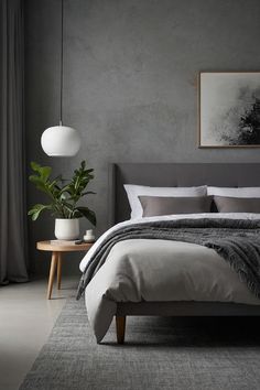 a bedroom with gray walls and white bedding, grey rugs and wooden furniture