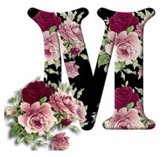 the letter m is made up of flowers and black fabric with pink roses on it