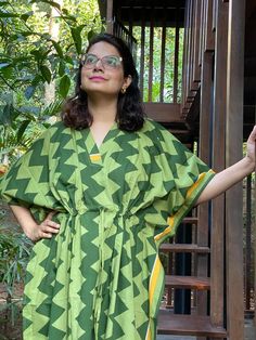 I made this caftan dress from a beautiful geometric pattern and is available in many colors. I used the softest mulmul cotton fabric to make this. It is extremely soft and it gets softer with every wash.It is so free flowing, that it will make you feel as if you aren't wearing anything at all ;)The beauty of the Kaftans is they will fit everyone so no need to worry about the size et all. All my Kaftans have deep necks(11-12 inches) so will fit all head sizes.However, the length of my kaftans wil Green Short Sleeve Tunic For Vacation, Traditional Green Tunic For Vacation, Green Casual Tunic Kaftan, Green Tunic Kimono For Vacation, Green Short Sleeve Kaftan For Vacation, Green Tunic Kaftan For Vacation, Traditional Green Tunic For Beach, Casual Green Kaftan With Kimono Sleeves, Green Short Sleeve Kaftan For Beach