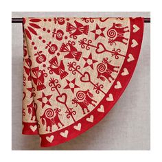 a red and white cloth with hearts on it