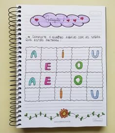 a spiral notebook with writing on it and an image of the word love written in spanish