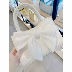 Indulge in sophistication and elegance with our Iridescent Chiffon Bow Couture Handbag. Crafted with high-quality materials, this handbag features a mesmerizing iridescent finish and a delicate chiffon bow. Upgrade your style and make a statement with this exclusive and luxurious handbag. Washi Tape Notebook, Chiffon Bow, Bow Bag, Couture Handbags, Jewelry Pins, Ladies Clutch, Stationery Pens, Hair Accessories Jewelry, Shoulder Messenger Bag