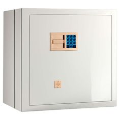 a close up of a white cabinet with blue squares on the front and bottom panel