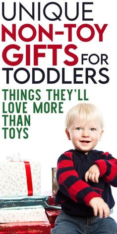 a young boy sitting on top of a pile of luggage with the title unique non - toy gifts for toddlers things they'll love more than toys