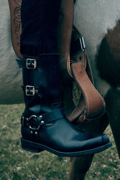 Demand attention and embrace the bold appeal of the Conway Moto Harness mid-calf boot, featuring harness and buckle detailing. The Goodyear welt construction guarantees long-lasting wear, while the leather outsole with rubber injection and cushioned chunky block heel seamlessly blend fashion and function. Pair with your favorite denim and cuff the bottoms for a look that’s both powerful and pulled-together. Mid Calf Boots, Mid Calf, Long Lasting, Buckle, Cuff