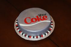 a cake with the word diet coke on it