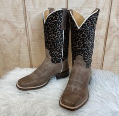 Everyone needs a pair of cheetah print cowboy boots in their closet! This Roper has a cheetah printed on faux brushed shaft and waxy brown full grain leather foot. Made for comfort, it has a REST comfort insole and dynamic arch support. 8 inch shaft height Leather lining  Double stitch welt Leather outsole  1 1/4 inch Square Toe Cowgirl Boots, Tan Square, Cowgirl Boots Square Toed, Pointy Boots, Square Toe Cowboy Boots, Square Toe Western Boots, Western Store, Double Stitch, Cowgirl Western