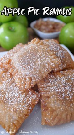 apple pie raviolis stacked on top of each other with apples in the background