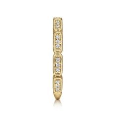 This 14K yellow gold stackable ring lends a regal, classic style to any look. The gleaming band is divided into shorter segments and garnished with 0.11cts of glittering diamonds. It's the perfect complement to your existing collection. Elegant Stackable Diamond Ring For Formal Occasions, Timeless Yellow Gold Diamond Ring With Platinum, Diamond White Stackable Jewelry For Formal Occasions, Formal Stackable Diamond Ring, Luxury 14k Stamped Diamond Ring For Formal Occasions, Heirloom Style Stackable Diamond Ring For Formal Occasions, Heirloom Style Formal Stackable Diamond Ring, Classic Stackable Diamond Ring For Formal Occasions, Formal Platinum Stackable Diamond Ring