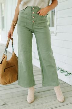 There is so much to love about these wide leg pants! They are so chic and will have you looking very trendy this fall! You are going to love pairing them with cozy sweaters and blouses alike!   High waist Multi-button down front closure Pockets  Wide legs Minimal st... Green Denim Pants, Green Jeans Outfit, Lightweight Pants, Mint Julep Boutique, Green Jeans, Pants Large, Summer Pants, Mint Julep, Model Fits