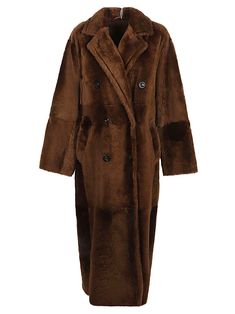 Long leather coat, double -breasted, rever neck, pockets inserted in the finance, closing with buttons. This item is in size 40 and the color is Brown Classic Long Fur Coat For Workwear, Brown Fur Coat With Pockets For Work, Long Fur Coat With Pockets For Work, Fur Coat With Buttons For Workwear In Fall, Fall Workwear Fur Coat With Buttons, Brown Long Fur Coat For Work, Fall Fur Coat With Buttons For Workwear, Brown Leather Fur Coat For Workwear, Luxury Brown Pea Coat For Winter