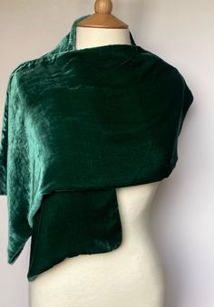 Luxurious and incredibly soft green silk velvet scarf. This scarf is extremely versatile; ideal for wrapping up in the cold weather and offers a touch of glamour to any outfit, whether it be casual or for a special occasion.  This will be perfect as a gift or a treat for yourself.  Composition: 100% Mulberry Silk Dry Clean Only Green Silk Scarf For Party, Green Silk Shawl Scarf, Elegant Green Scarf For Winter, Elegant Green Winter Scarves, Elegant Green Winter Scarf, Elegant Green Scarves For Party, Elegant Green Silk Shawl Scarf, Elegant Green Silk Shawl, Fantasy Scarf