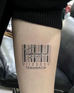 a bar code tattoo on the leg