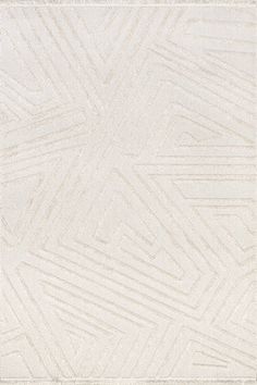 a white rug with an abstract design on the bottom, and a square pattern in the middle