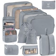 the grey travel bag is packed with all its contents including toiletries and other items