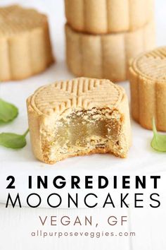 two ingredient mooncakes are cut in half and stacked on top of each other