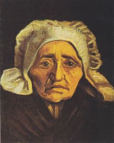 an old woman wearing a white headdress