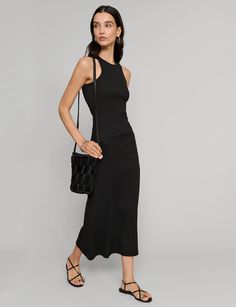 Delilah Black Ribbed Tank Dress-BESTSELLER Sleeveless Stretch Ribbed Maxi Dress, Ribbed Stretch Sleeveless Maxi Dress, Chic Solid Color Ribbed Maxi Dress, Sleeveless Ribbed Maxi Dress For Evening, Black Sleeveless Ribbed Maxi Dress, Sleeveless Black Ribbed Maxi Dress, Spring Black Ribbed Maxi Dress, Black Ribbed Maxi Dress For Night Out, Black Ribbed Midi Length Maxi Dress