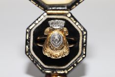 VINTAGE ORIGINAL 18K GOLD NATURAL DIAMOND DECORATED FACE DESIGN WRITTEN RING In very good condition. Total weight is 5.4 grams. Totally is diamond about 0.15 carat. The diamond is has G-H color and vs-vvs-s1 clarity. Ring size is US 5.7 We can make any size. Please contact for any questions. Classic Diamond Signet Ring Collectible, Collectible Classic Diamond Signet Ring, Antique Yellow Gold Engraved Ring With Diamond Accents, Antique Engraved Yellow Gold Ring With Diamond Accents, Antique Diamond Ring With Vvs Clarity, Victorian Diamond Ring With Vvs Clarity, Antique Signet Ring With Diamond Accents For Formal, Antique Signet Ring With Diamond Accents For Formal Occasions, Vintage Pear-shaped Diamond Ring With Brilliant Cut