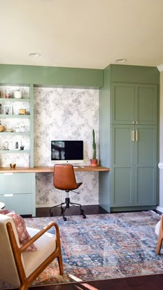 a living room filled with furniture and green walls