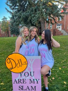 three girls posing in front of a sign that says, do you are my slam?