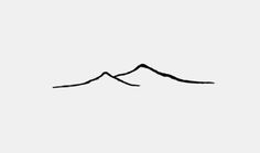 a black and white drawing of a mountain