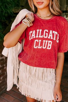 Happy tailgating season! Kickback and enjoy the calm before the score in this trendy vintage inspired tee! Features ultra soft crimson colored material, a round neckline, short sleeves, front 'TAILGATE CLUB' graphic design, and a relaxed classic tee silhouette that ends in a straight hemline. - This piece is a perfect game day option for fans of Arkansas, Georgia, Texas Tech, Alabama, Oklahoma, Ole Miss, Kansas, SMU, and more! Measurements S : Bust 38", Hip 38", Length 24.5", Sleeve Length 7", W Casual Letter Print T-shirt For Tailgating, School Spirit T-shirt For Tailgating With Crew Neck, School Spirit T-shirt For Tailgating, School Spirit Crew Neck T-shirt For Tailgating, Red T-shirt For Fall Game Day, Casual Crew Neck Tops For Tailgating, Collegiate Short Sleeve T-shirt For Fall, Red T-shirt For School Spirit In Fall, Black Curves