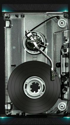 a black and white photo of a disk drive