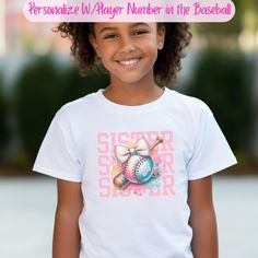 "This super cute baseball shirt is the perfect little sister baseball shirt. In addition to its Coquette styled baseball design and pink bow it is personalized with a player number. ⭐️LOOKING FOR OTHER SOFTBALL/BASEBALL RELATED PRODUCTS? VISIT HERE⭐️ https://www.etsy.com/shop/MomsNextAdventure?section_id=31807982 ⭐️HOW TO PERSONALIZE & ORDER⭐️ 1 - Select shirt color 2 - Select shirt size 3 - Add your athlete's number in the personalization box. I will add it to the baseball. 4 - Click \"Add-To-C Personalized White Sporty T-shirt, Customizable Pink Tops For Game Day, Pink Tops For Baseball Game Day, White Personalized Team Spirit Top, Pink T-shirt For Baseball Season With Team Name, Personalized Short Sleeve Tops For Game Day, White Personalized Sporty Top, Sporty Personalized White Top, Personalized White Tops For Game Day