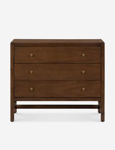 the chest of drawers is made out of wood and has three drawers on each side