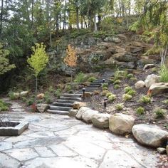 stone steps lead up to the top of a hill