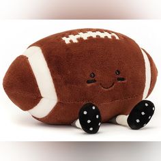 a stuffed toy with a football on it