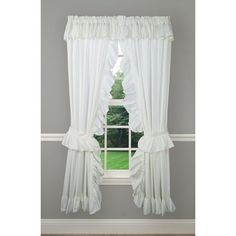 a white window curtain with ruffled edges