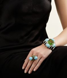 Cushion-cut peridot, cabochon turquoise, black enamel, brilliant-cut diamonds, 18K gold , and platinum Luxury Unique Cuff Bracelet With Gemstone, Elegant Turquoise Cuff Bracelet With Gemstone, Luxury Gemstone Cuff Jewelry, Luxury Untreated Turquoise Cuff Bracelet, Elizabeth Taylor Diamond, Luxury Turquoise Gemstone Cuff Bracelet, Modern Jewellery Design, David Webb, Bracelet Collection