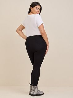 FIT Model is 5'10” wearing size 1. . 2” signature waistband. . 27” inseam. . MATERIALS + CARE Cotton blend fabric. 95% cotton, 5% spandex. . Machine wash cold. Tumble dry low. Imported. DETAILS Stirrup inset. Pocket detail. The best plus size women's full length signature waist stirrup pocket legging. skinny & tapered pants in black made of premium. Torrid is your destination for cozy fall and winter clothes to keep you warm and comfortable. Mid-rise Tight Bottoms With Elastic Waistband, Tight Mid-rise Bottoms With Elastic Waistband, Tight High Rise Bottoms With Elastic Waistband, High Rise Tight Bottoms With Wide Waistband, Basic Full-length Bottoms With Elastic Waistband, Casual Bottoms With Contoured Waistband, Casual Tight Leggings With Contoured Waistband, Casual Leggings With Contoured Waistband, Basic Stretch Straight Leg Bottoms