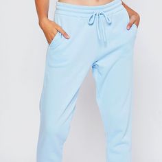 Warm And Cozy Blue Fleece Lined Sweatpants With Adjustable Waistband. -50% Cotton, 50% Polyester -Warm Fleece Lining -Elastic Waistband With Adjustable Drawstring -Side Front Pockets *Model Is Wearing A Size Small Blue Joggers For Spring Loungewear, Spring Blue Joggers For Loungewear, Light Blue Athleisure Bottoms For Loungewear, High Waist Blue Sweatpants For Loungewear, Light Blue Relaxed Fit Sweatpants For Loungewear, Blue Relaxed Fit Leisure Pants, Blue Relaxed Fit Pants For Leisure, Blue Stretch Pants For Leisure, Casual Light Blue Sweatpants For Loungewear