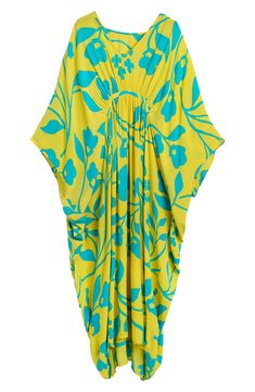 Hit the beach or kick it poolside in this flowy kaftan that features an allover floral pattern, kimono-inspired sleeves and a sharkbite hem. V-neck Kimono-inspired sleeves 100% rayon Hand wash, line dry Imported Beachwear Kaftan With Kimono Sleeves For Daywear, Daywear Kaftan With Kimono Sleeves For Beachwear, Spring Beachwear Kaftan With Tropical Print, Spring Tropical Print Kaftan For Beachwear, Spring Tropical Print Kaftan For Beach, Casual Printed Kaftan For Poolside, Printed Spring Kaftan For Beachwear, Summer Floral Print Kaftan For Daywear, Flowy Floral Print Kaftan With Short Sleeves