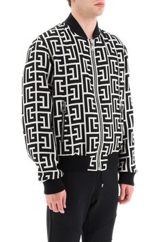 100% Fleece Wool | Balmain Men's Rib Trim All-over Logo Bomber in Ivoire/Black | FW23/24 Balmain Men, Monogram Pattern, Mens Wear, Dolce And Gabbana Man, High End Fashion, Patch Logo, Casual Button Down Shirt, Fitness Models, Bomber Jacket