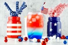 red, white and blue drinks with american flags in them