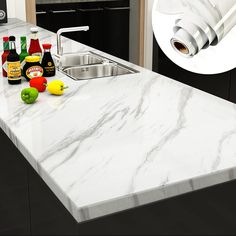 an image of a kitchen setting with marble counter tops