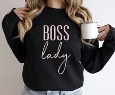 Boss Lady Sweatshirt, Mom Sweatshirt, Christmas Gifts for Mom, Mother hustler life Sweatshirt, Funny Mom Sweatshirt, New Mom Gift, Boss Babe FIT & SIZING: A sturdy and warm unisex sweatshirt bound to keep you warm in the colder months. A pre-shrunk, classic fit sweater that's made with air-jet spun yarn for a soft feel and reduced pilling. * Comfortable and flattering for both men and women. * Please see the size chart in the photos to obtain an accurate size. Measure one of your favorite sweate Boss Christmas Gifts, New Mom Gift, Funny Mom, Mom Sweatshirt, Sweatshirt Christmas, Favorite Sweater, Valentines Day Shirts, Christmas Gifts For Mom, New Mom