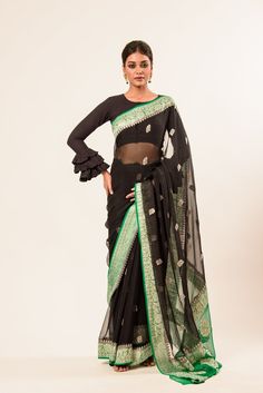 Black Khaddi Banarasi Saree with Silver Boota work and Green Border Fitted Cotton Silk Saree With Sheer Dupatta, Transitional Zari Weaving Blouse Piece For Reception, Eid Cotton Silk Pre-draped Saree, Transitional Reception Blouse With Zari Weaving, Transitional Blouse Piece With Zari Weaving For Reception, Cotton Silk Saree With Self Design For Reception, Saree With Zari Weaving For Reception And Transitional Seasons, Reception Cotton Silk Saree With Self Design, Formal Cotton Silk Saree With Sheer Dupatta