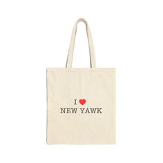 This 100% cotton bag comes in one size - 15" x 16"- perfect for everyday wear. While the canvas material will show off your designs in great colors, it's durable and will last for years. The bag features 20" handles (made from the same canvas), making it easy to carry even with a week's worth of shopping. .: 100% cotton canvas .: Heavy fabric (12 oz/yd² (406.9 g/m .: Sewn-in label .: Available in natural and black colors New York Tote Bag, New York Tote, New York Canvas, Canvas Making, Canvas Tote Bag, Cotton Bag, Sew-in Labels, Heavy Fabric, Canvas Material